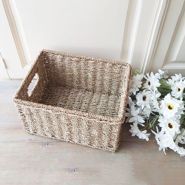 seagrass storage tote with metal frame and cut out handles made in Vietnam